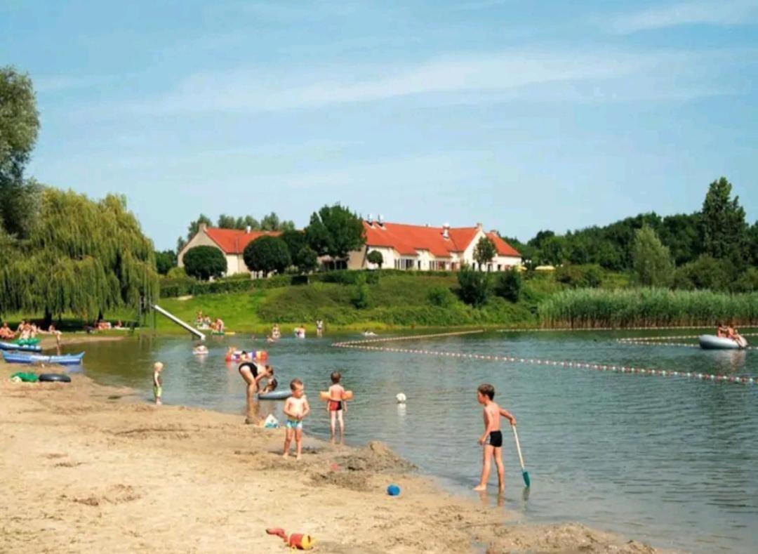 7 Person House With Garden, Firepit, Swimming Lake, Hammock, Child Friendly, In- And Outside Playground, Slide, And Great Coffee Ewijk 外观 照片